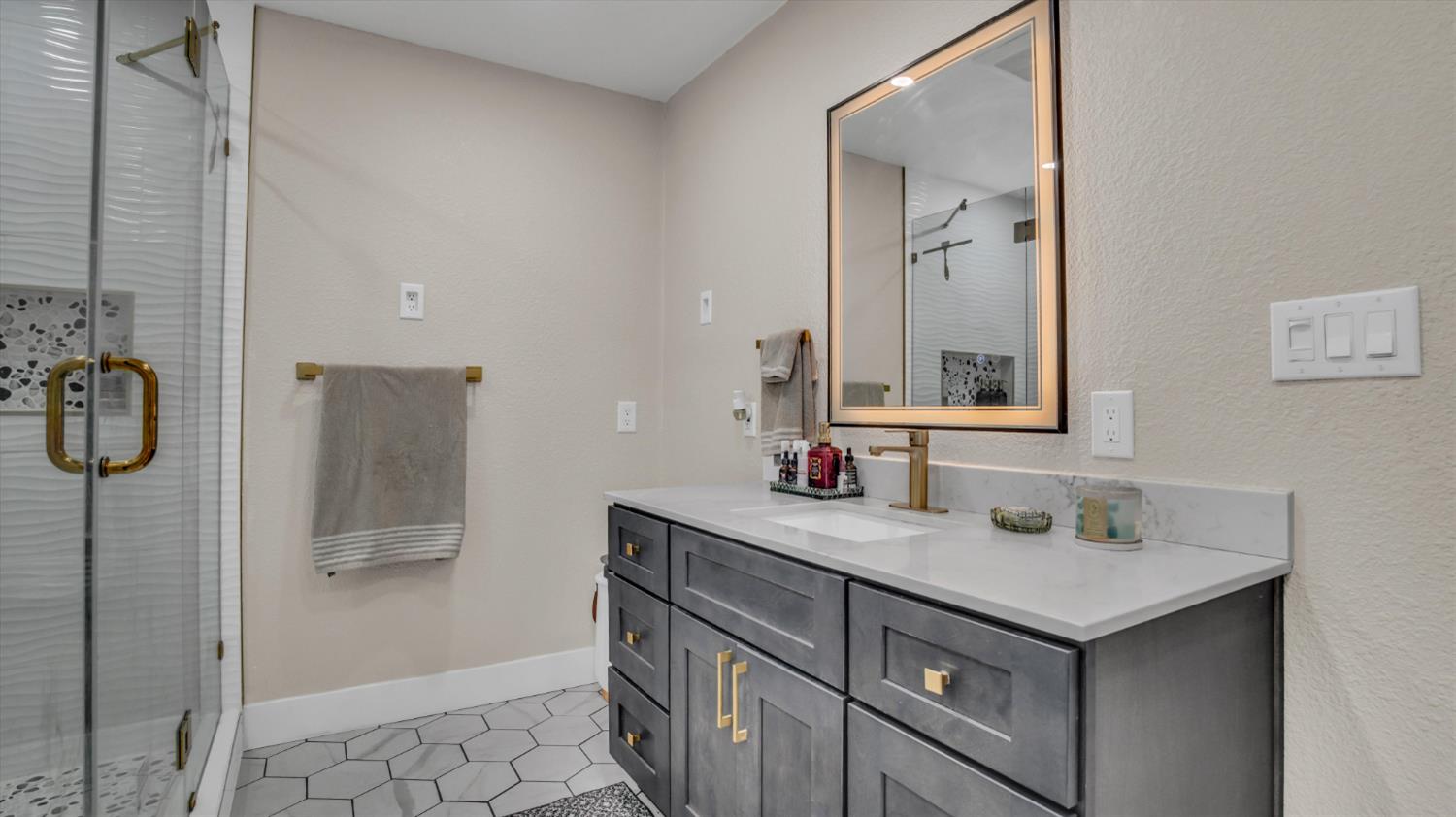 2331 East Woodson Road Acampo, CA 95220 - Photo 25 of 59 a bathroom with a sink and a mirror