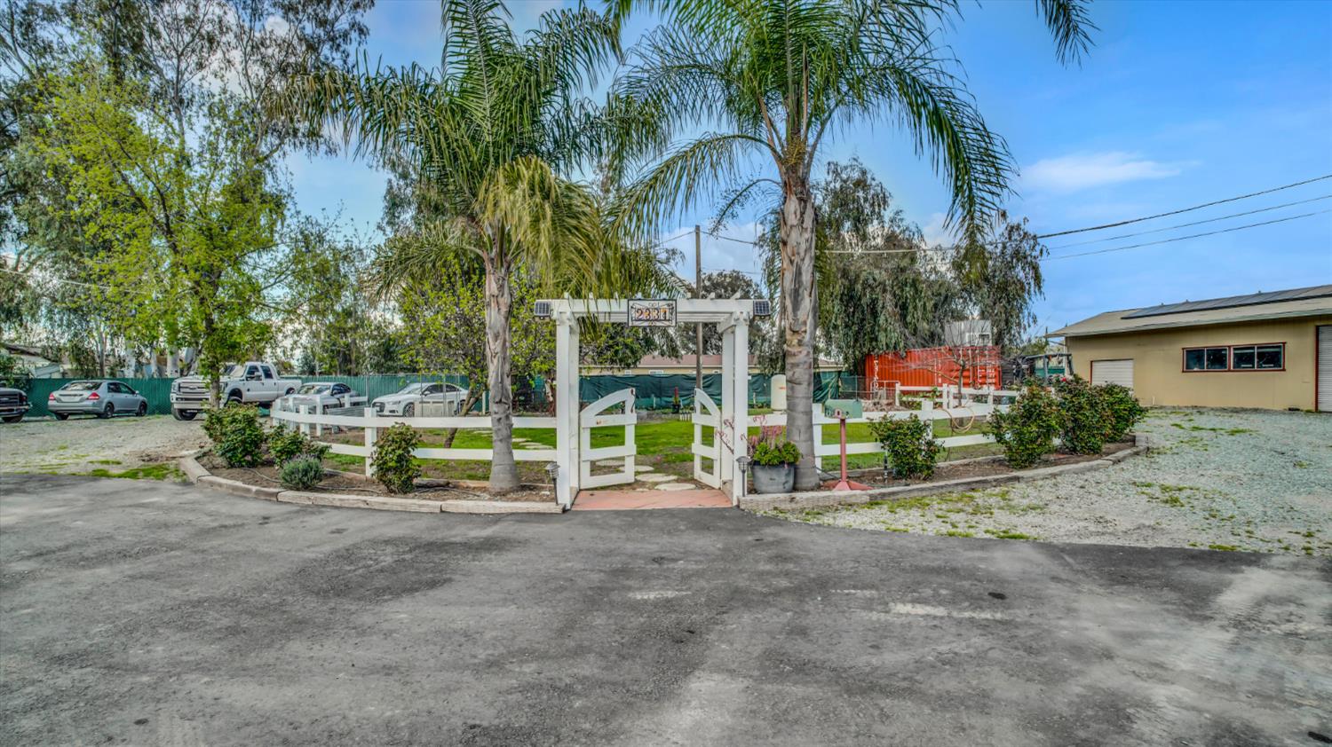 2331 East Woodson Road Acampo, CA 95220 - Photo 38 of 59 a view of multiple houses with a yard