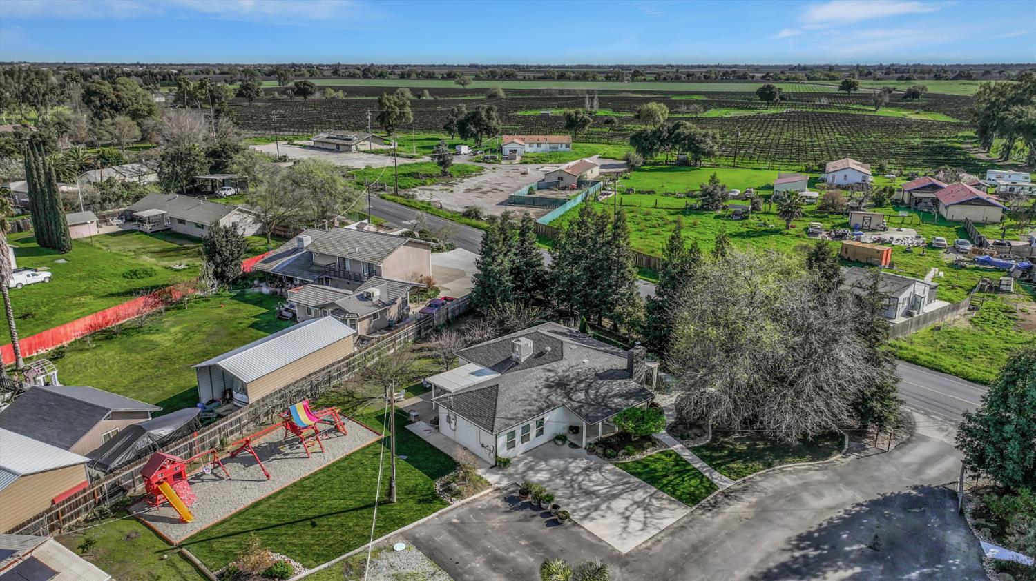 2331 East Woodson Road Acampo, CA 95220 - Photo 54 of 59 an aerial view of a house with a yard lake view and mountain view