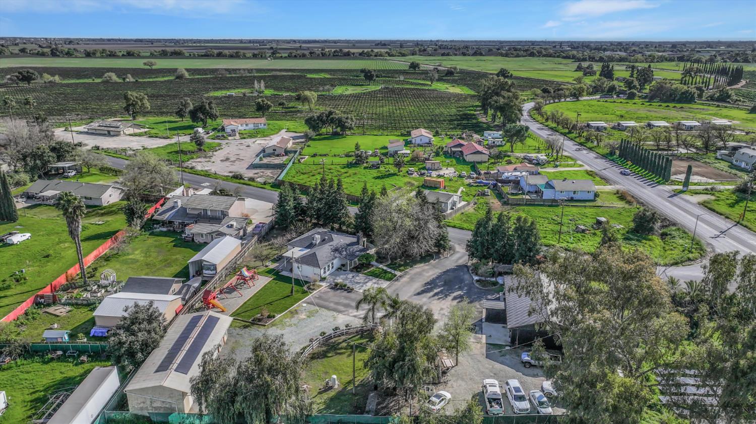 2331 East Woodson Road Acampo, CA 95220 - Photo 56 of 59 a view of a lake with a yard