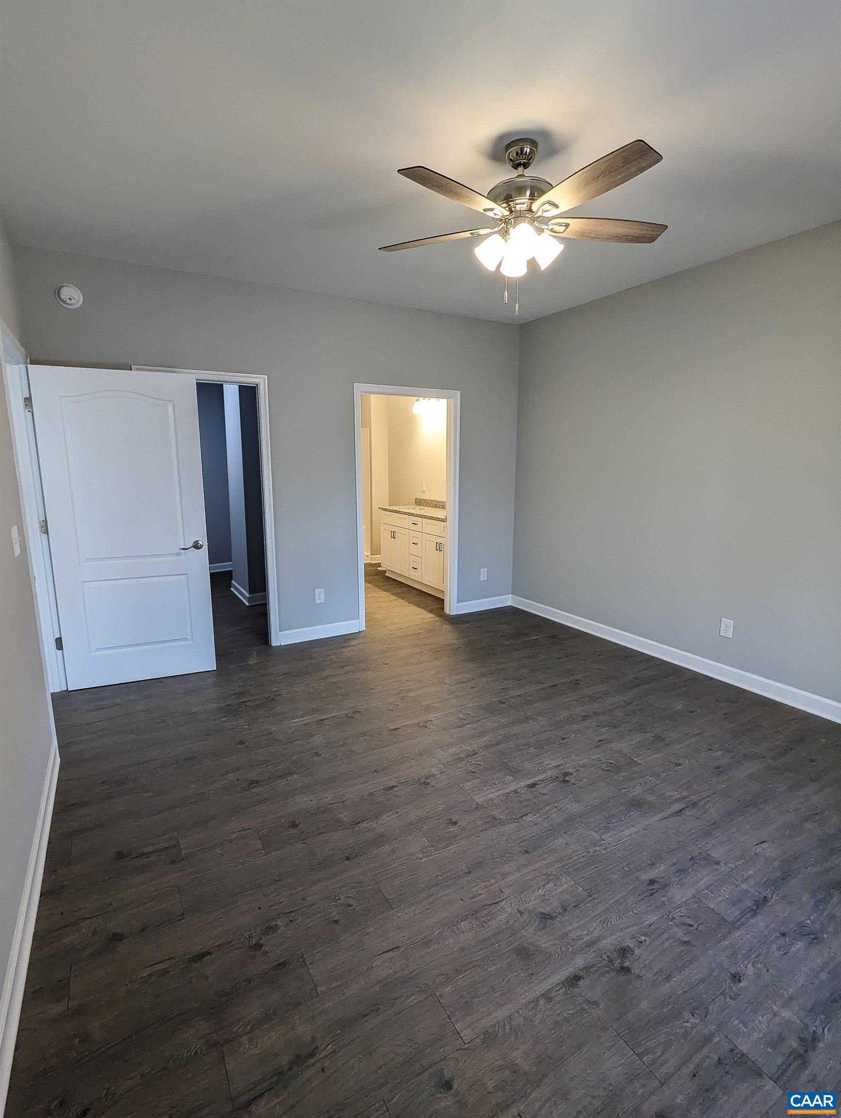 13 Amethyst Road Palmyra, VA 22963 - Photo 16 of 39 a view of a livingroom with a ceiling fan window and hardwood floor
