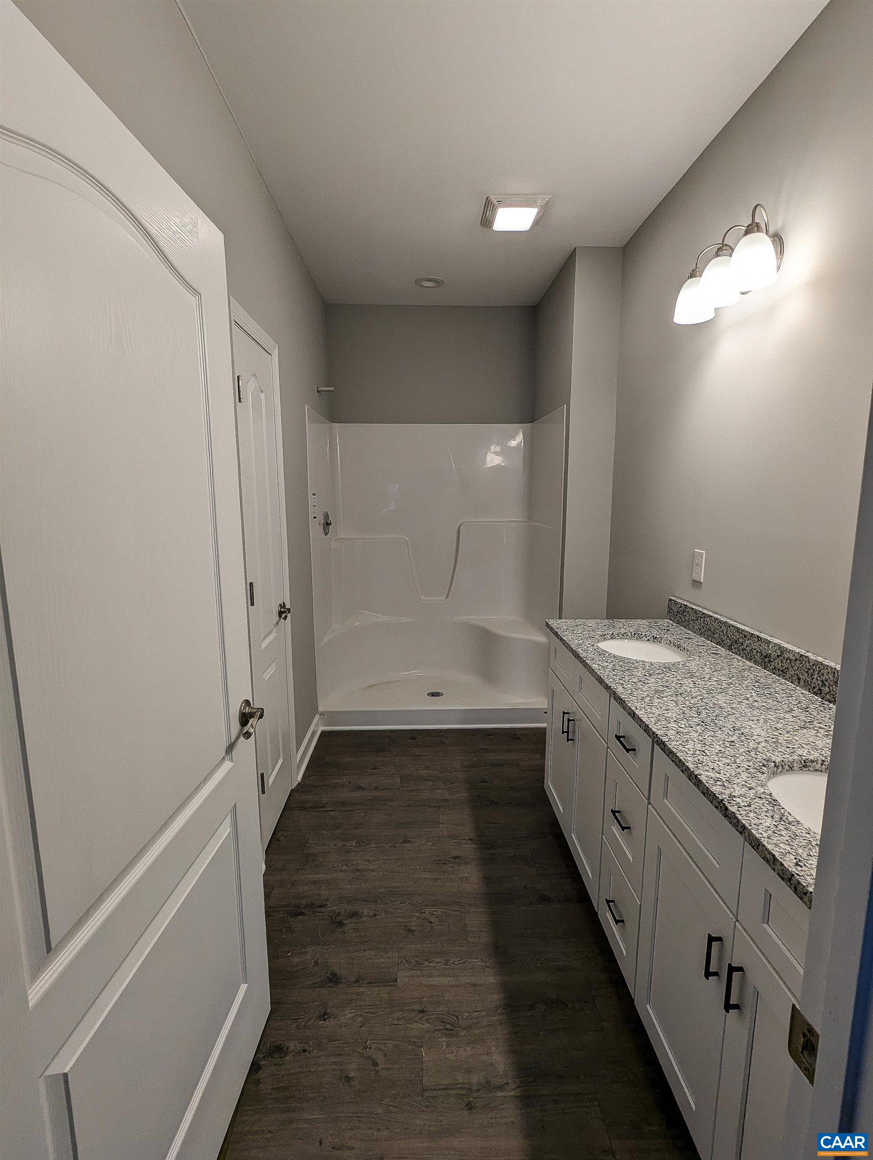 13 Amethyst Road Palmyra, VA 22963 - Photo 18 of 39 a bathroom with a sink and a mirror