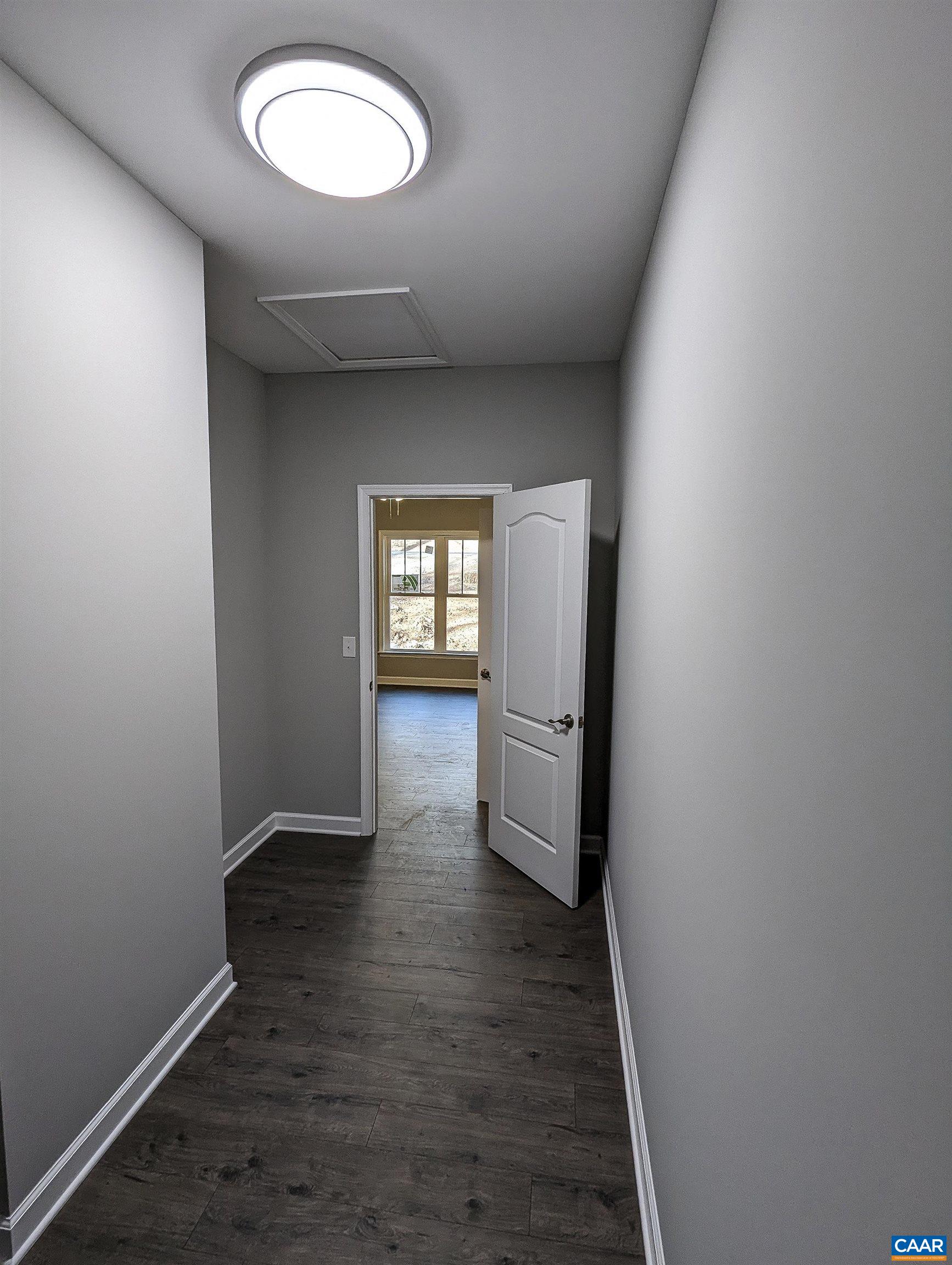 13 Amethyst Road Palmyra, VA 22963 - Photo 19 of 39 an empty room with wooden floor and windows