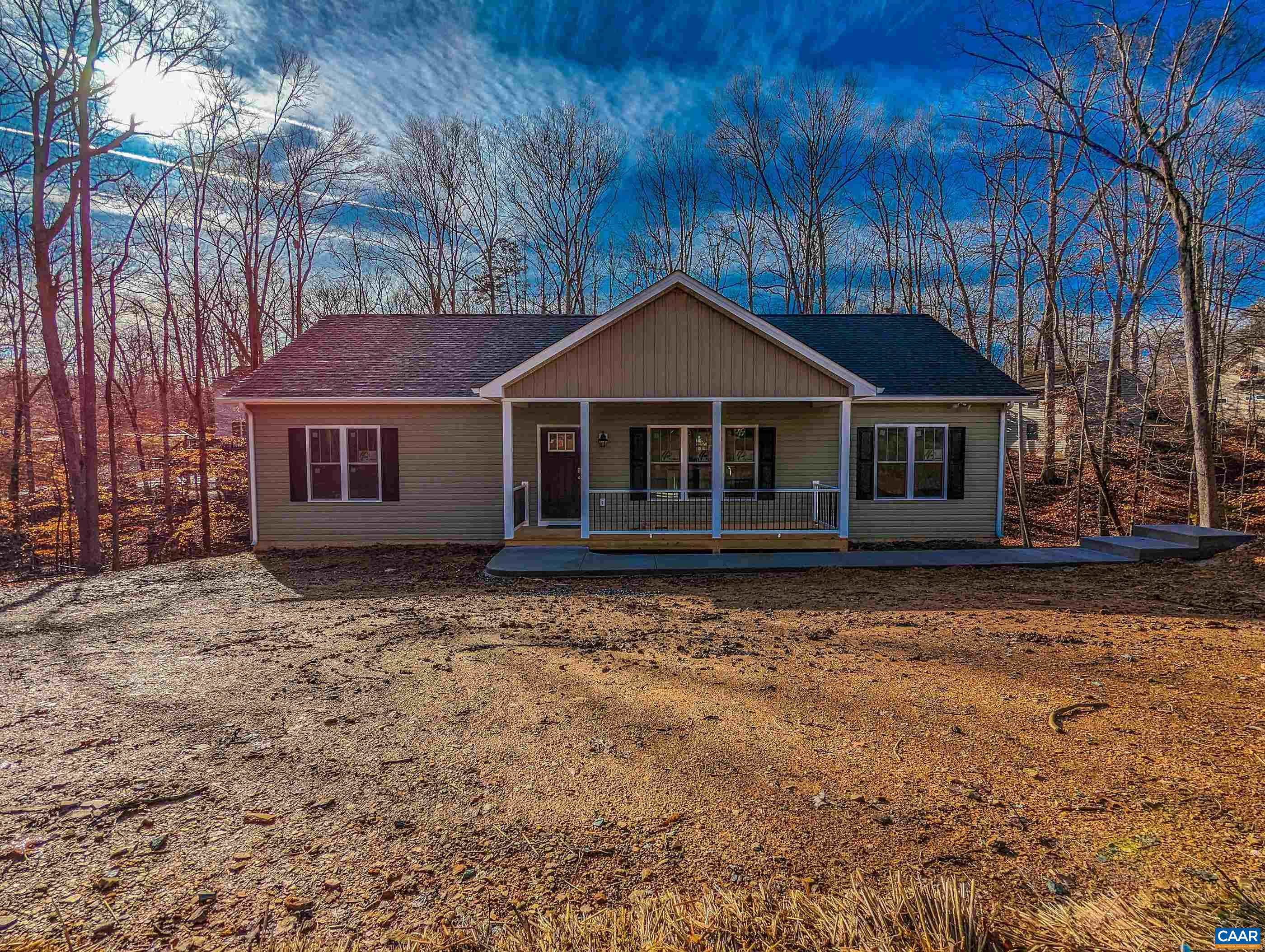 13 Amethyst Road Palmyra, VA 22963 - Photo 3 of 39 a house with trees in the background