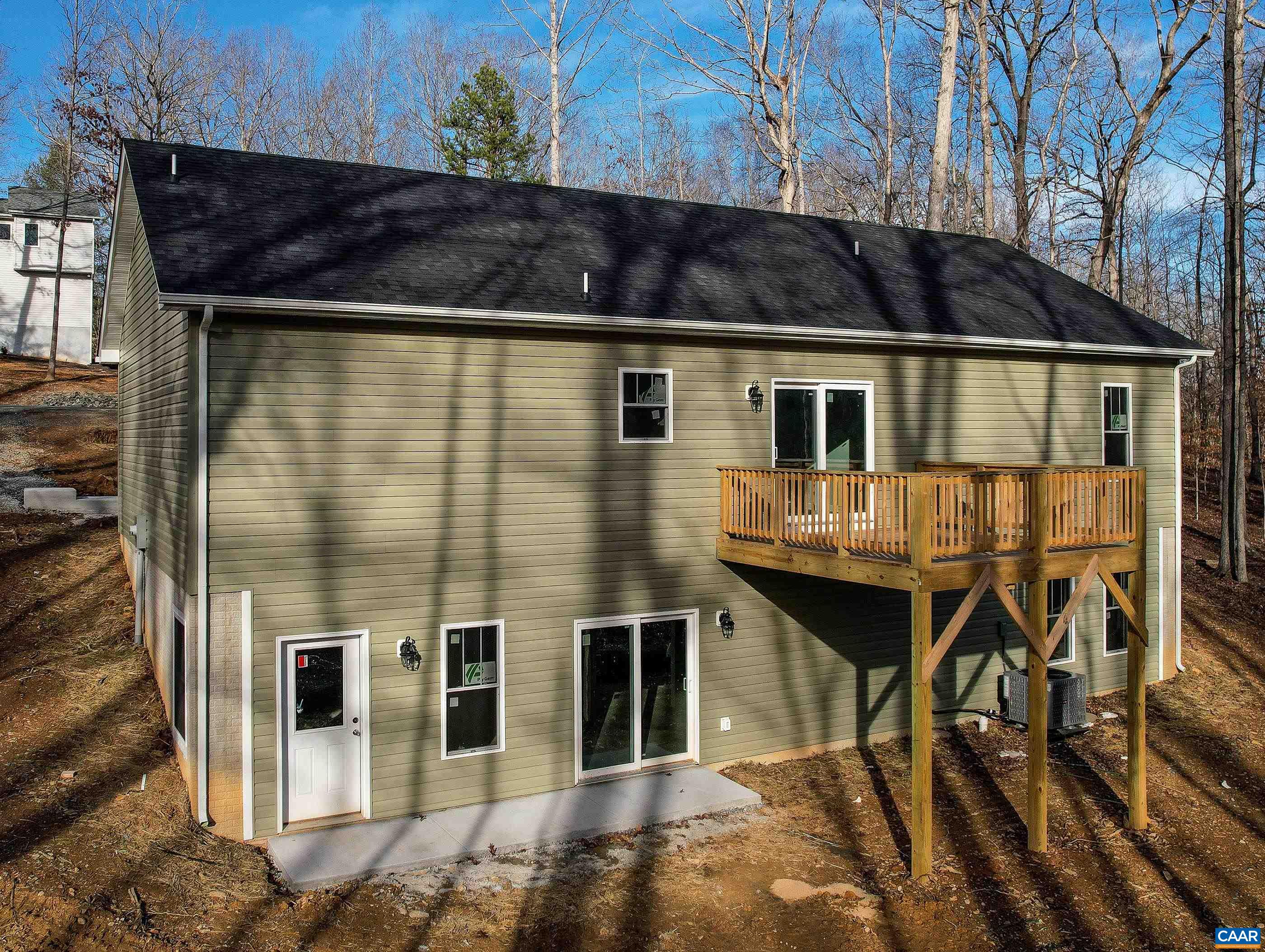 13 Amethyst Road Palmyra, VA 22963 - Photo 8 of 39 a front view of a house with glass windows