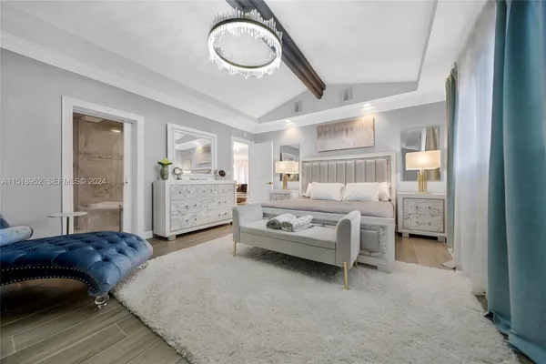 a bedroom with a bed and a cabinets