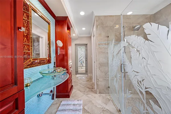 a bathroom with a double vanity sink and mirror