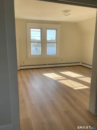 a view of an empty room with window