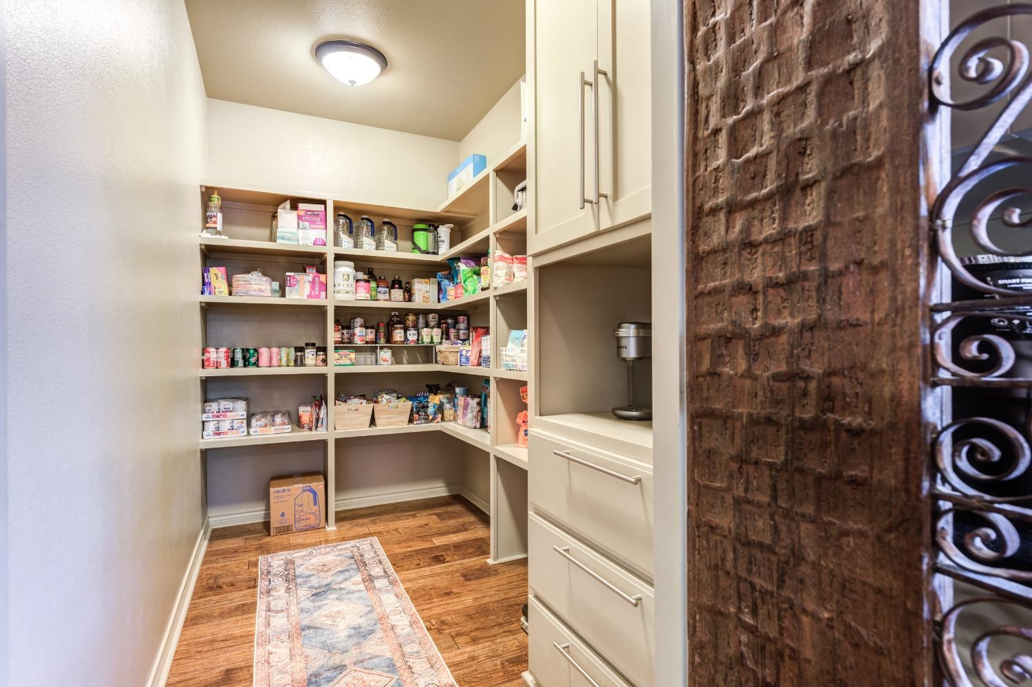 4808 115th Street Lubbock, TX 79424 - Photo 14 of 50 a room with furniture and a book shelf