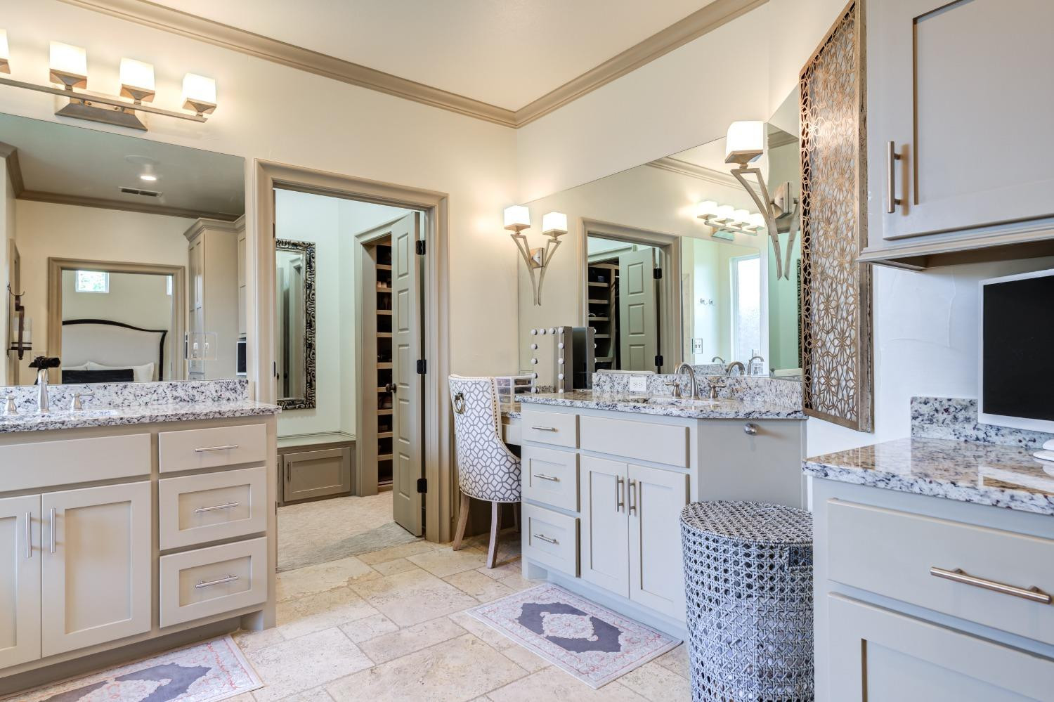 4808 115th Street Lubbock, TX 79424 - Photo 19 of 50 a bathroom with a granite countertop sink and a mirror