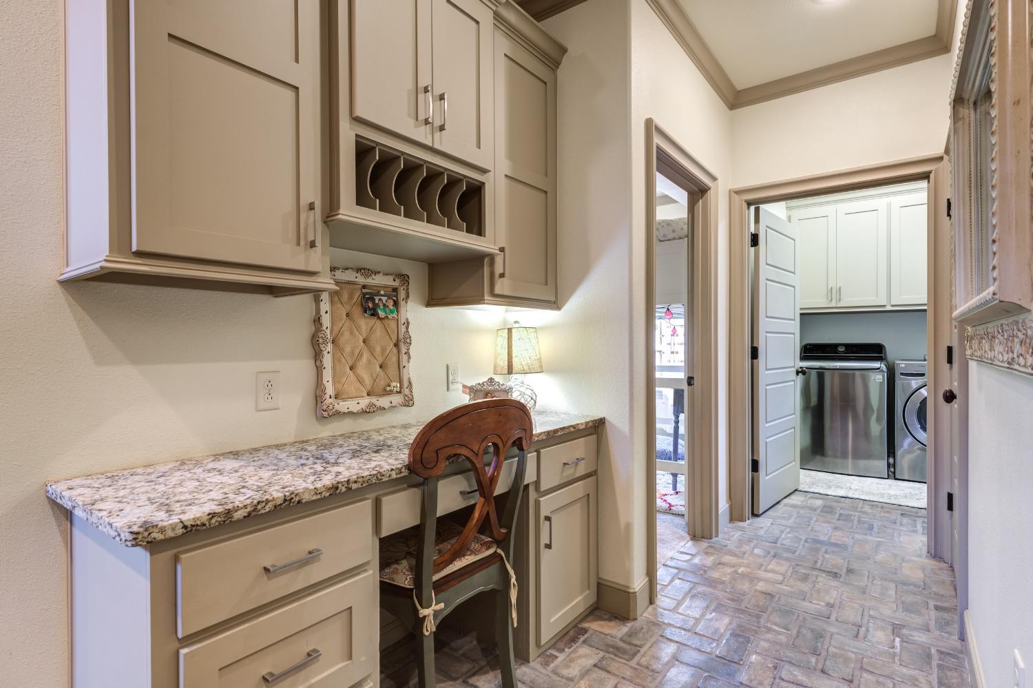 4808 115th Street Lubbock, TX 79424 - Photo 30 of 50 a kitchen with stainless steel appliances granite countertop a refrigerator and a stove