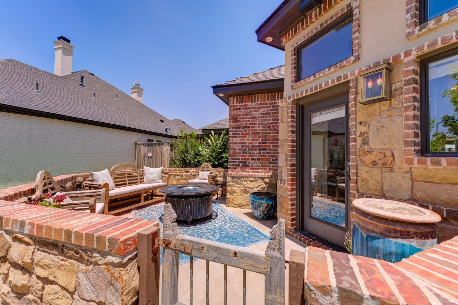4808 115th Street Lubbock, TX 79424 - Photo 3 of 50 a outdoor space with a couch and chairs