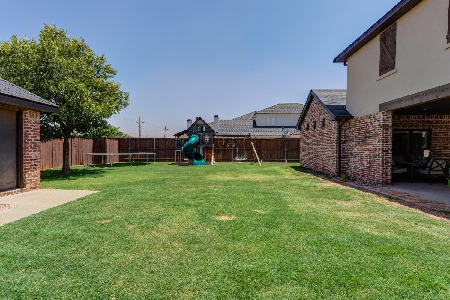 4808 115th Street Lubbock, TX 79424 - Photo 48 of 50 front view of a house with a yard