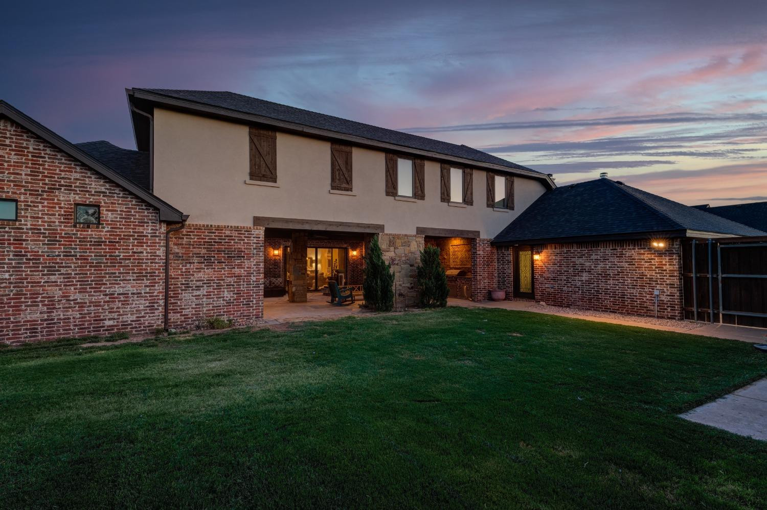 4808 115th Street Lubbock, TX 79424 - Photo 49 of 50 a view of a house with a yard and porch
