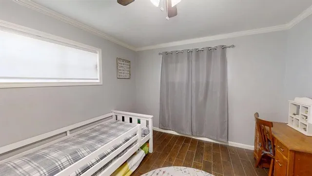 a view of room with wooden floor