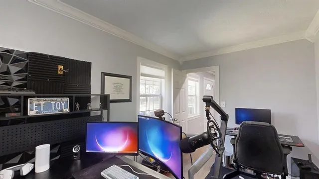 a room with furniture and a flat screen tv