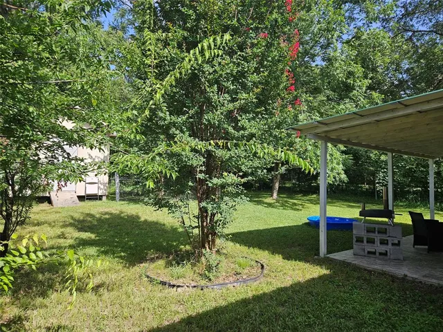 a view of a park with swings