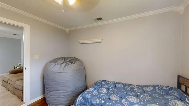 a room with a bed and a window
