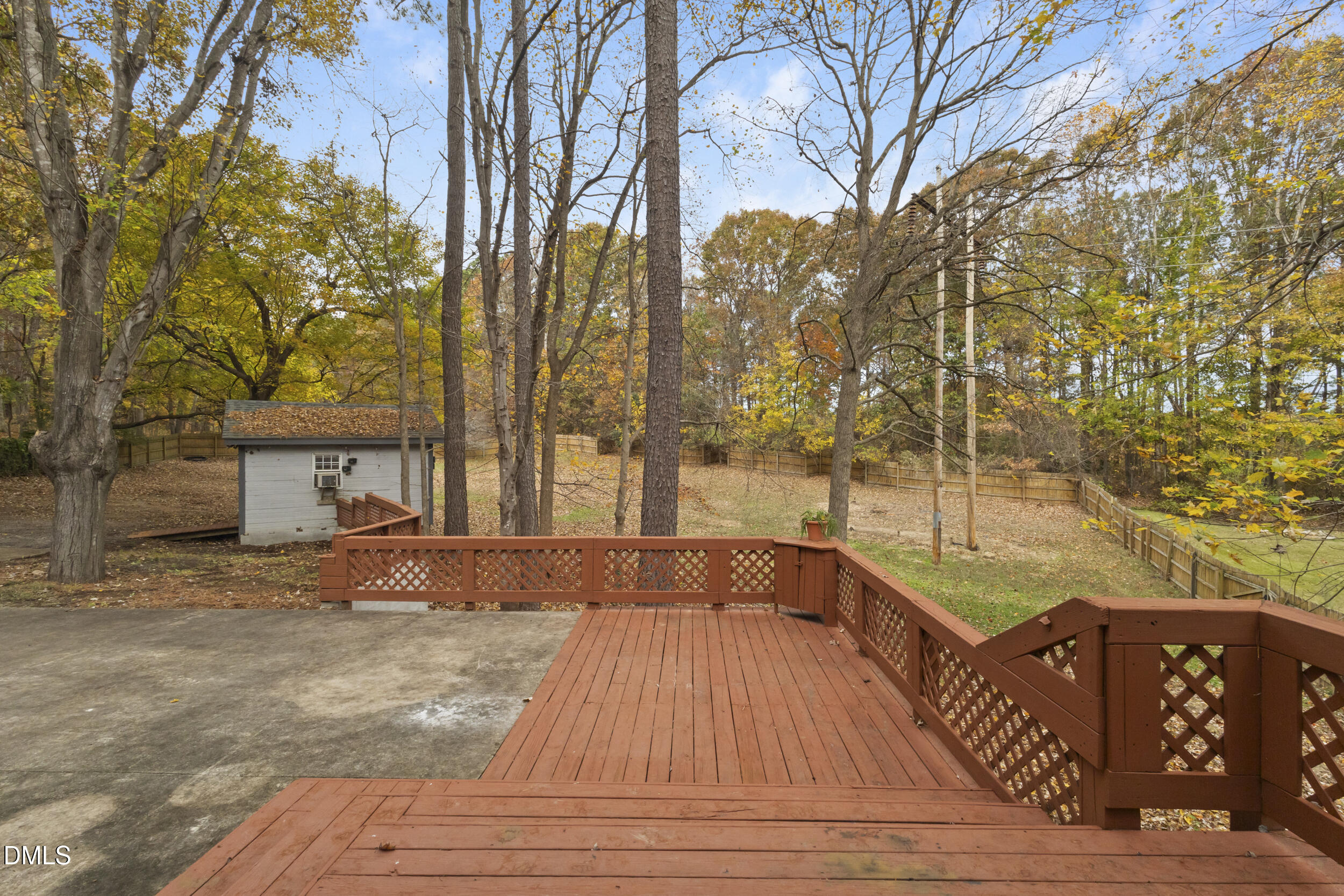 2001 Shenandoah Road Raleigh, NC 27603 - Photo 25 of 27 a view of backyard with large trees and potted plants