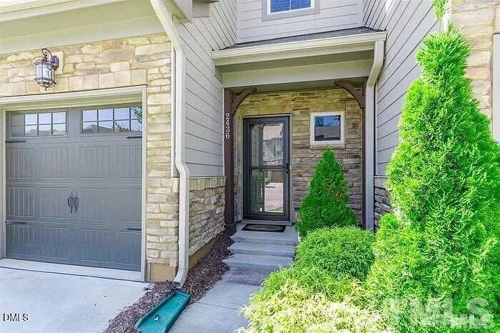 2436 Baslow Drive Apex, NC 27539 - Photo 2 of 21 a view of a entryway door of the house