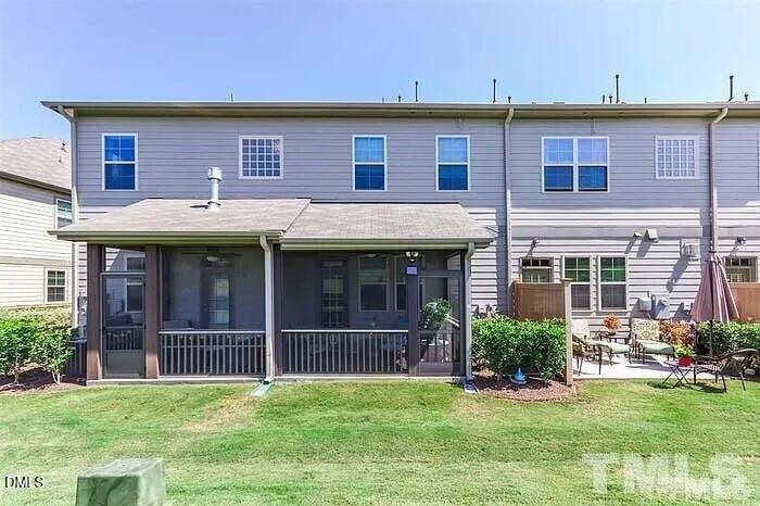 2436 Baslow Drive Apex, NC 27539 - Photo 21 of 21 a view of a house with garden and deck