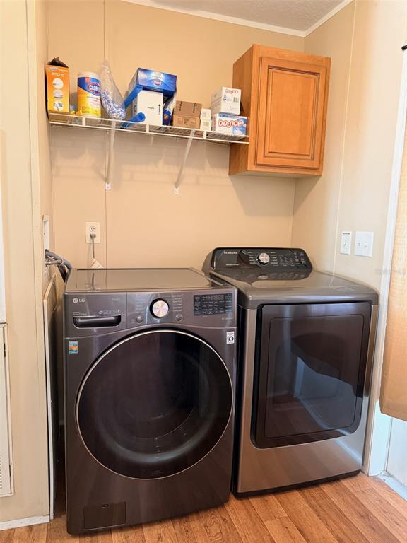 10730 198th Terrace O'Brien, FL 32071 - Photo 11 of 29 a utility room with dryer and washer