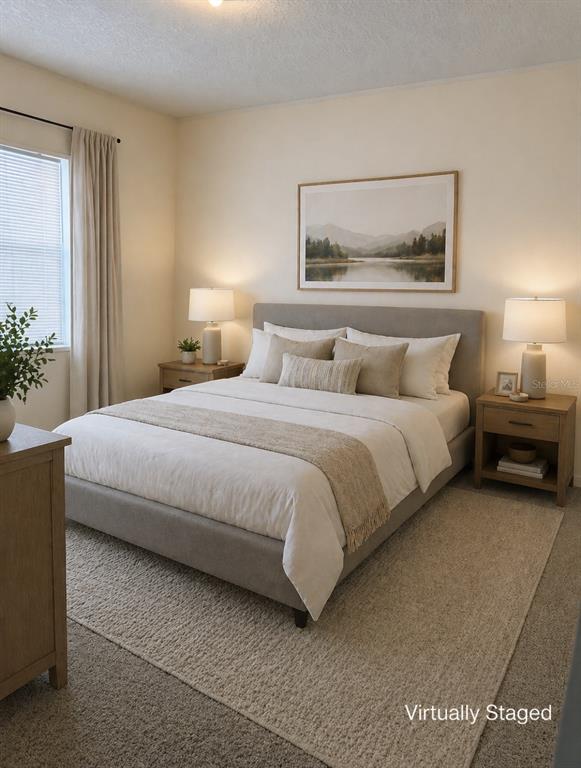 10730 198th Terrace O'Brien, FL 32071 - Photo 24 of 29 a bedroom with a bed and a painting