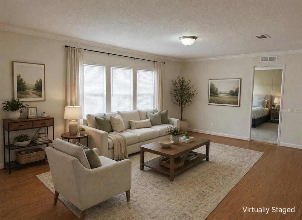 10730 198th Terrace O'Brien, FL 32071 - Photo 7 of 29 a living room with furniture and a window