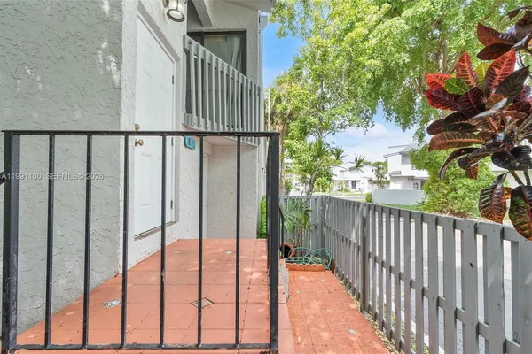 a view of staircase with white walls