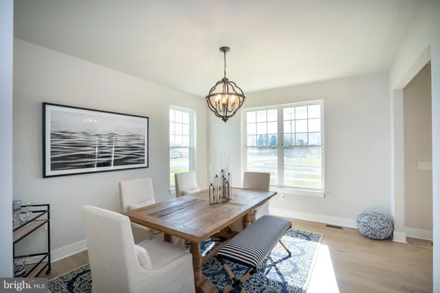a view of livingroom with furniture and windows