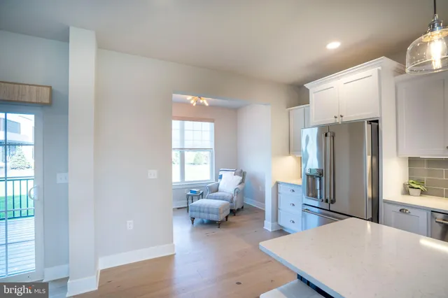 a living room with a couch and a closet