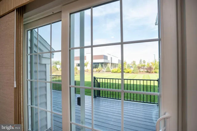 a view of staircase with wooden floor and stairs