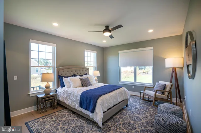 a view of room with painting on the wall