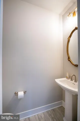 a bedroom with a bunk bed and a chair