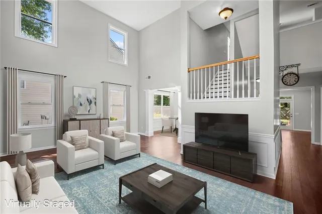 a kitchen with stainless steel appliances granite countertop wooden cabinets stove top oven and sink