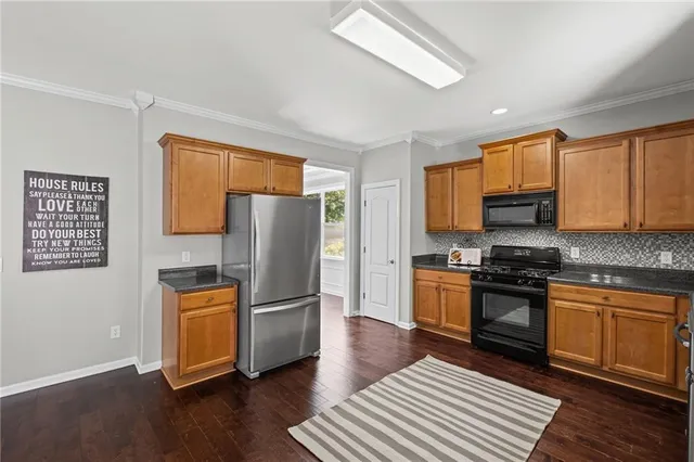 a bathroom with a double vanity sink and mirror