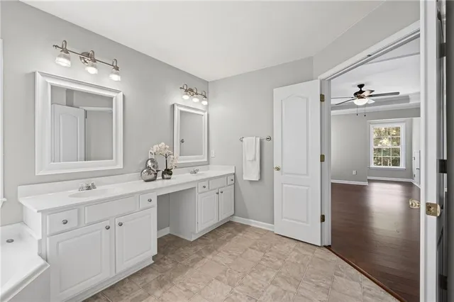 a view of house with backyard and a garden