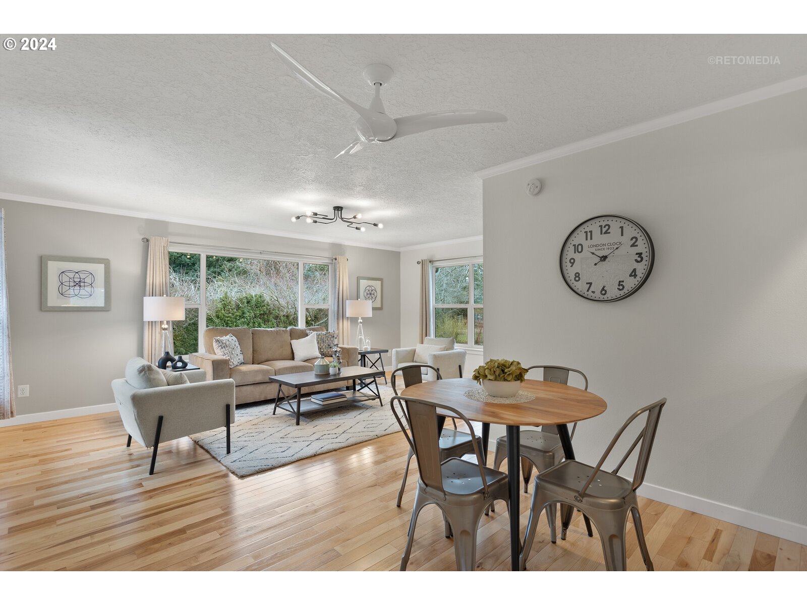 28100 Southeast Church Road Boring, OR 97009 - Photo 13 of 41 a dining room with furniture a large window and wooden floor