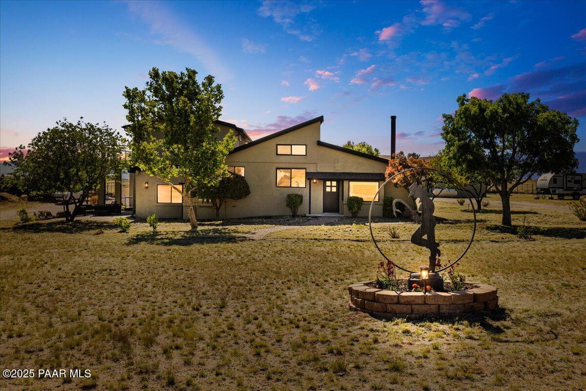 1445 South Table Mountain Road Chino Valley, AZ 86323 - Photo 1 of 81 a front view of a house with a yard