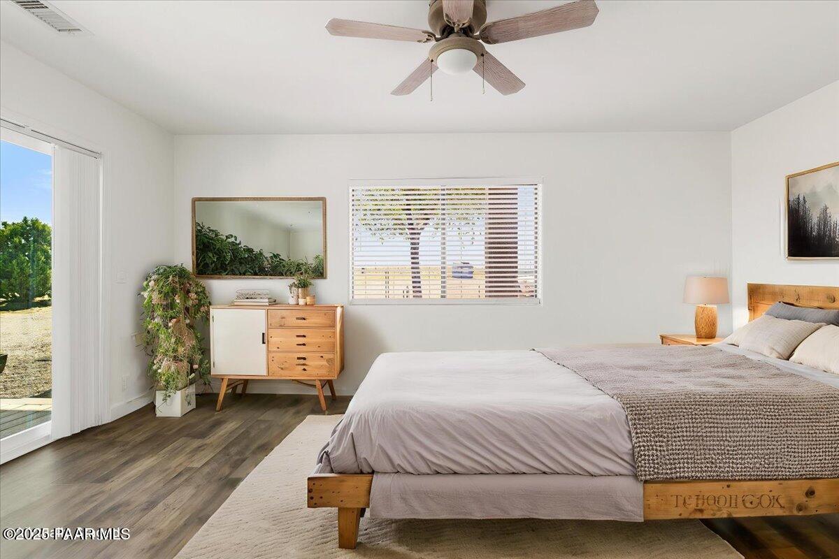1445 South Table Mountain Road Chino Valley, AZ 86323 - Photo 20 of 81 a bedroom with a bed and flat tv screen on the dresser