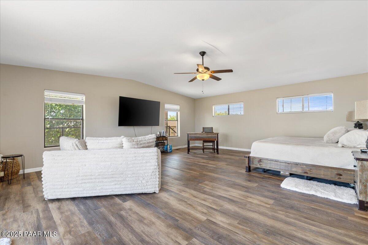 1445 South Table Mountain Road Chino Valley, AZ 86323 - Photo 37 of 81 a living room with furniture and a flat screen tv