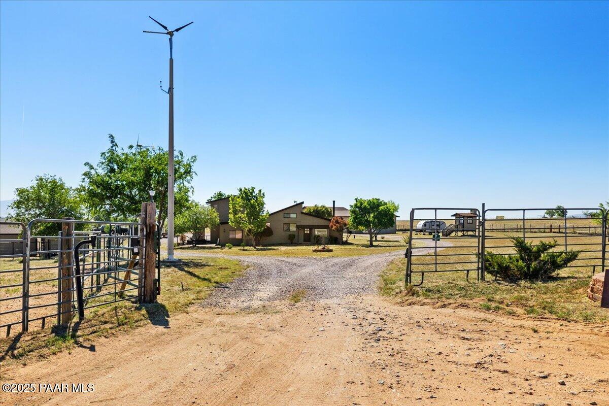 1445 South Table Mountain Road Chino Valley, AZ 86323 - Photo 64 of 81 a view of a yard with palm trees