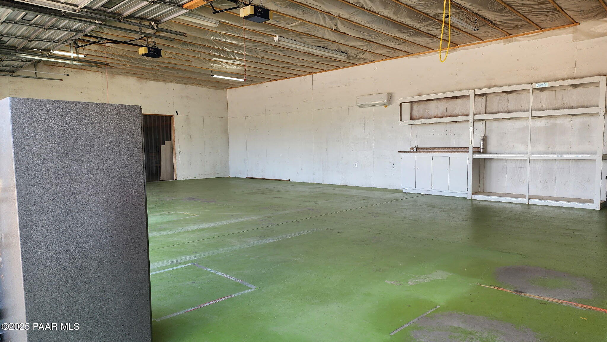 1445 South Table Mountain Road Chino Valley, AZ 86323 - Photo 79 of 81 a view of a room with shelves
