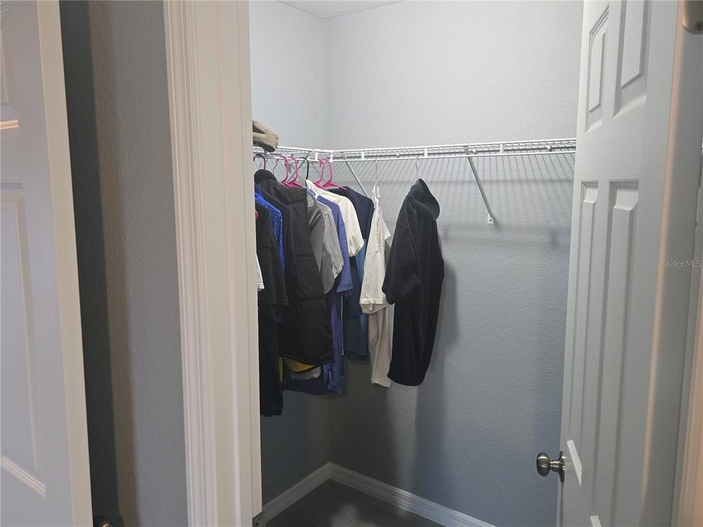 838 Northwest 124th Street Citra, FL 32113 - Photo 22 of 27 a view of walk in closet