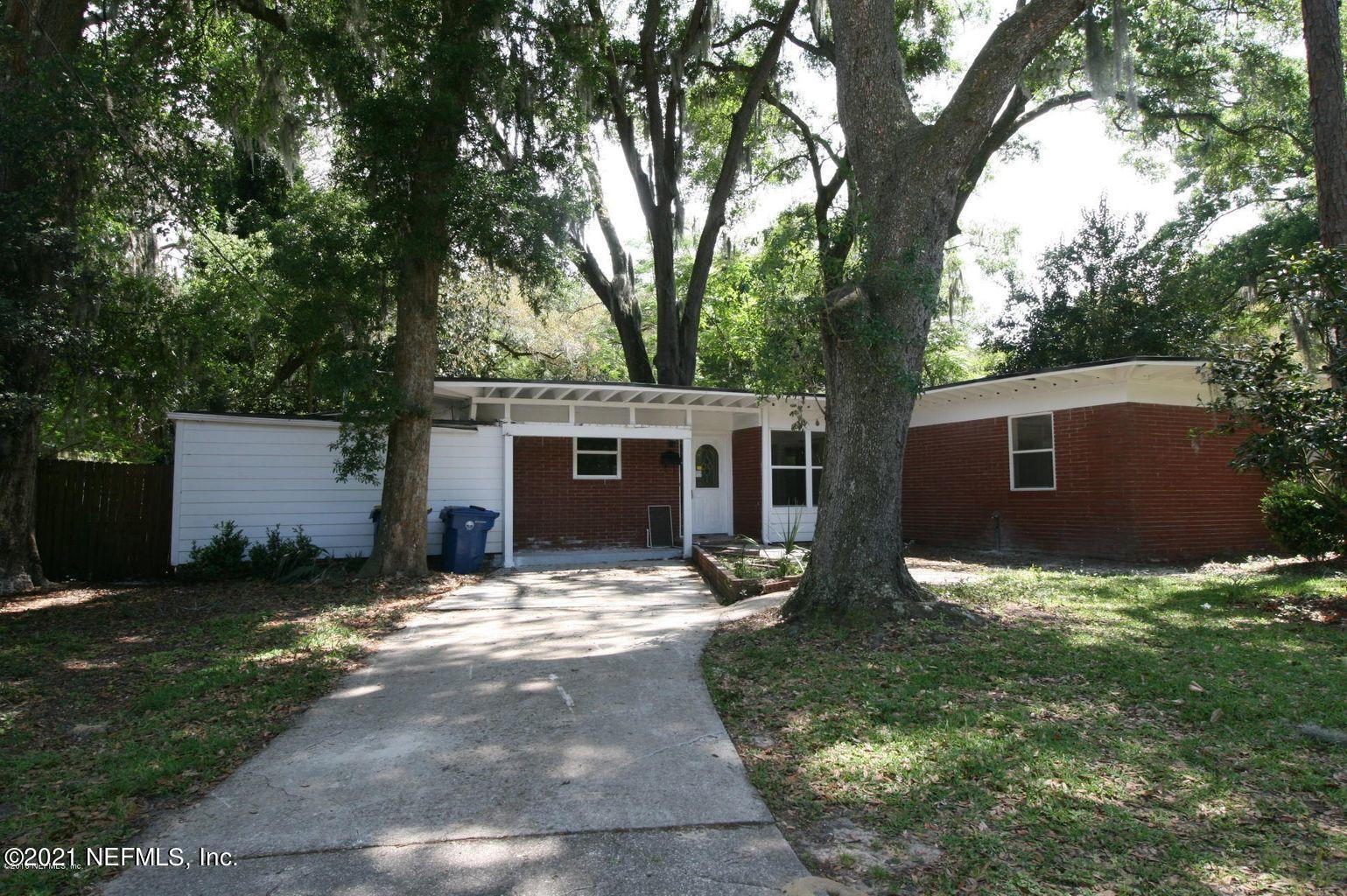 6422 Swallow Cove Road Jacksonville, FL 32211 - Photo 2 of 17 a view of a house with a yard