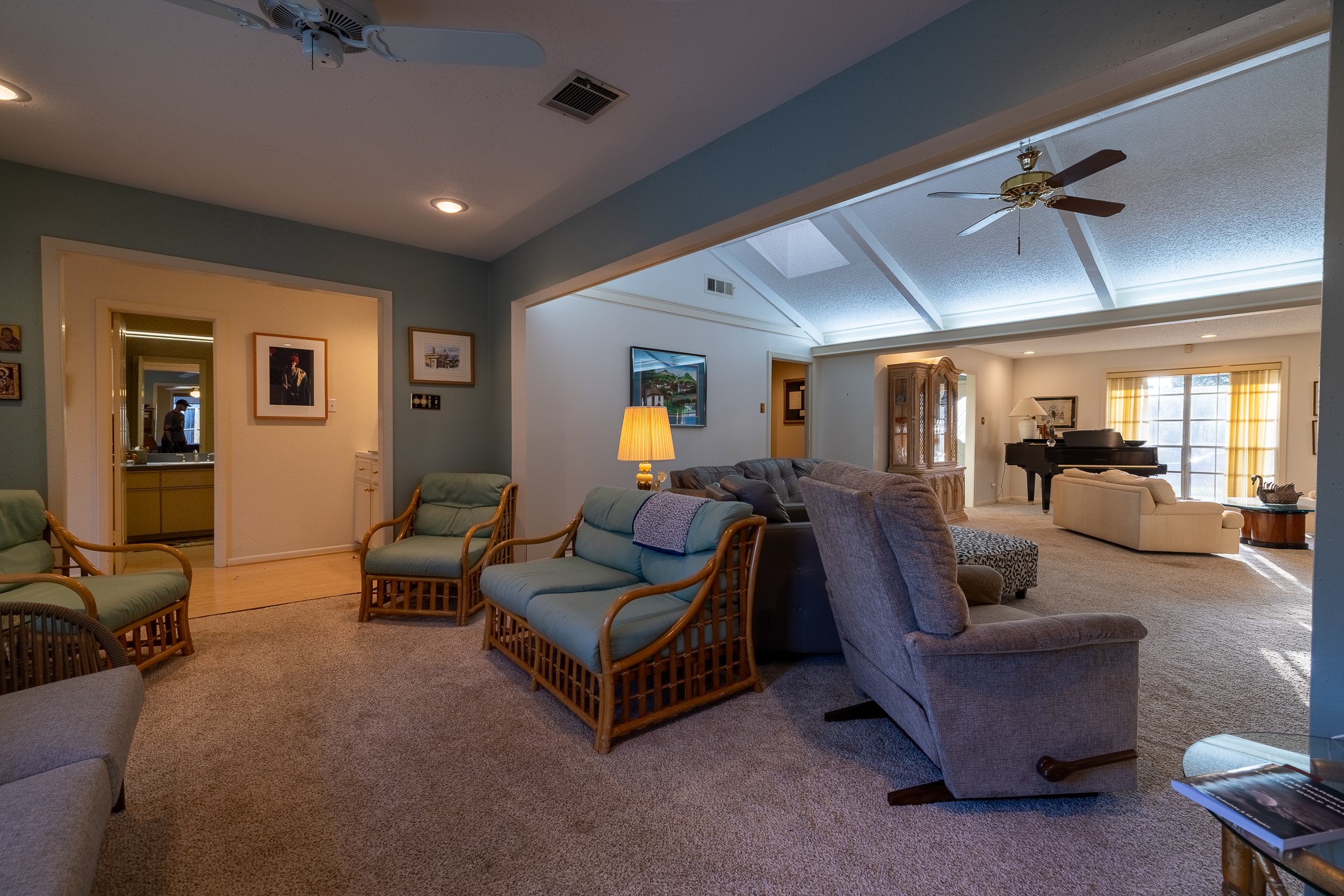 506 Timber Terrace Road Houston, TX 77024 - Photo 10 of 12 a living room with furniture and a mirror