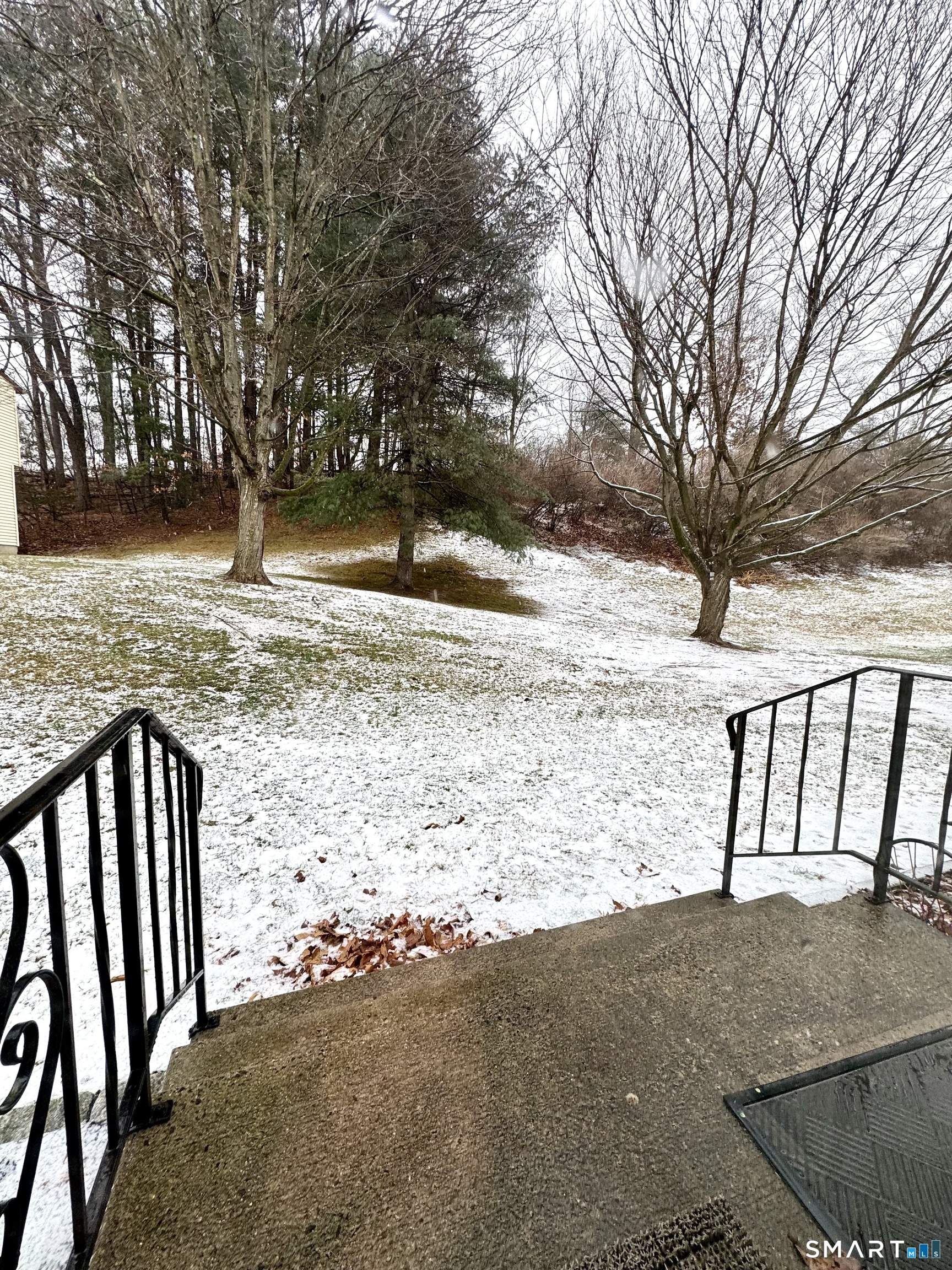 39 Horton Hill Road, Unit 6E Naugatuck, CT 06770 - Photo 11 of 26 a view of a yard with wooden fence