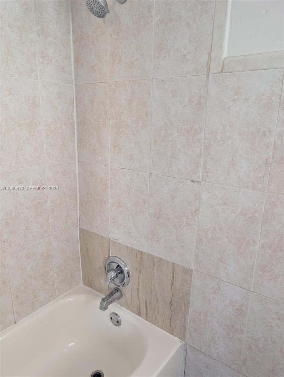 1461 Southwest 5th Street, Unit 2 Miami, FL 33135 - Photo 4 of 16 a bathroom with a sink