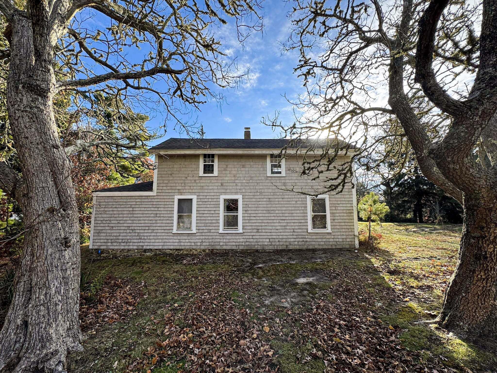 30 Pond Street Osterville, MA 02655 - Photo 8 of 26 front view of a house with a yard