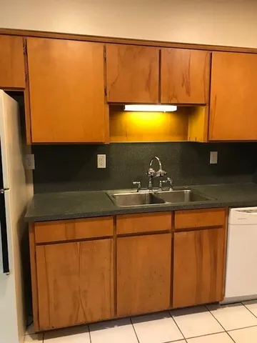 a utility room with washer and dryer